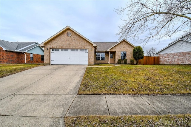 single story home featuring a garage and a front yard