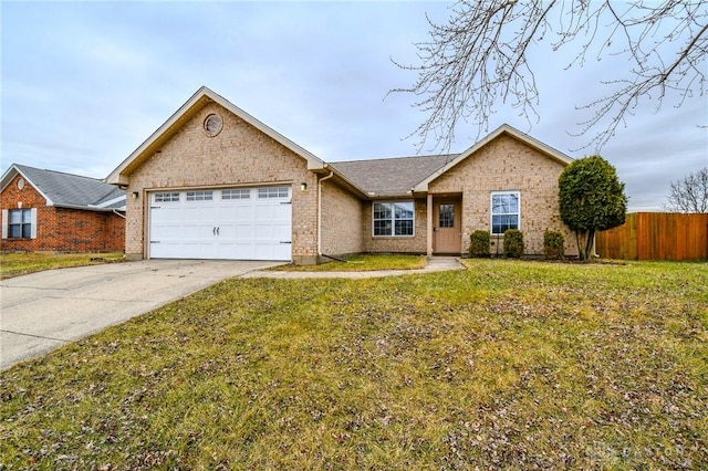 single story home featuring a garage and a front yard