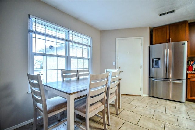 view of tiled dining area