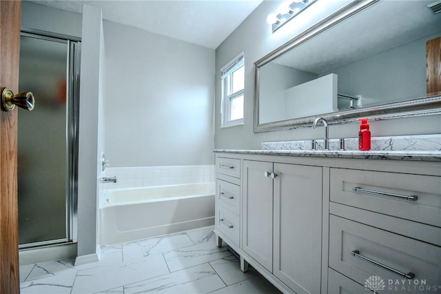 bathroom featuring vanity and plus walk in shower