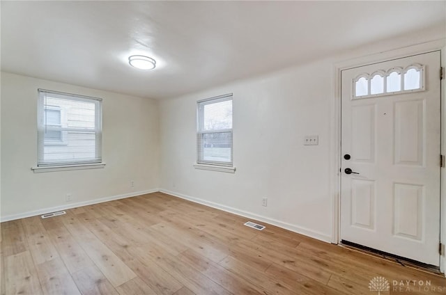 entrance foyer featuring light wood-type flooring