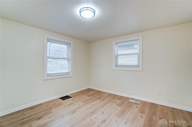 empty room featuring light wood-type flooring