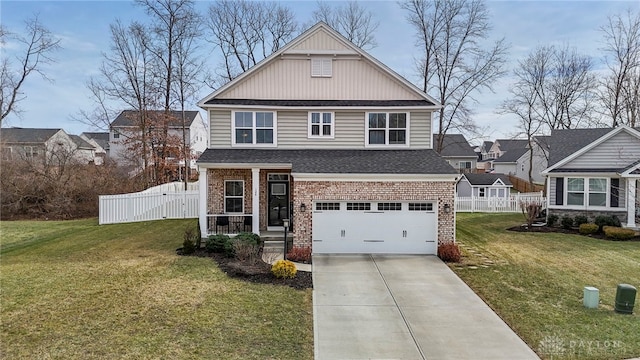 view of front of house with a garage and a front yard