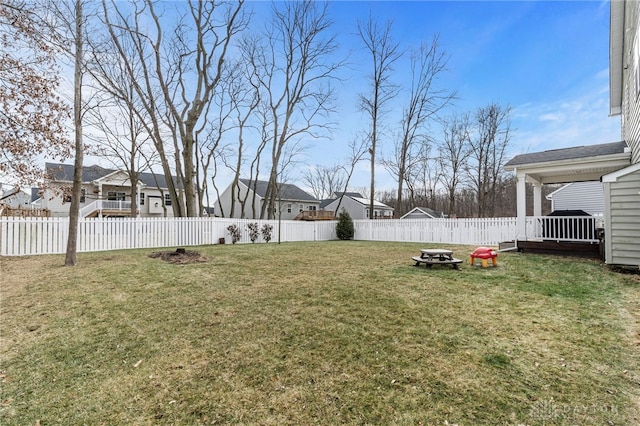 view of yard featuring a fire pit