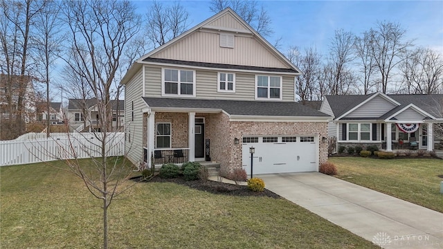 view of front of house with a garage and a front yard