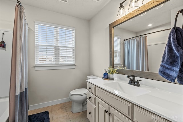 bathroom with vanity, curtained shower, tile patterned floors, and toilet