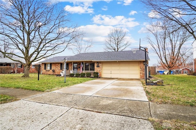 single story home with a porch, a garage, and a front yard