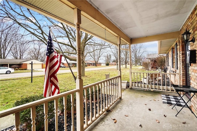 balcony featuring a porch