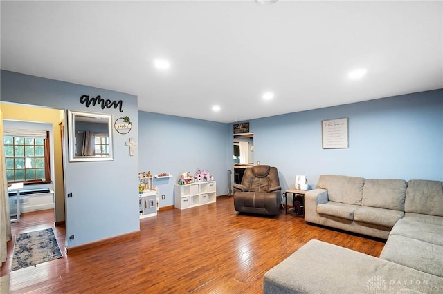 living room with hardwood / wood-style flooring