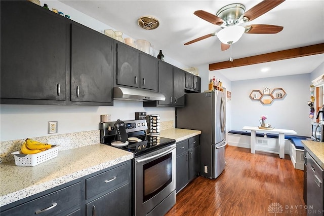 kitchen featuring ceiling fan, dark hardwood / wood-style floors, beamed ceiling, and appliances with stainless steel finishes