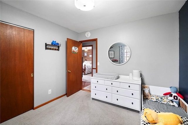 bedroom with light colored carpet