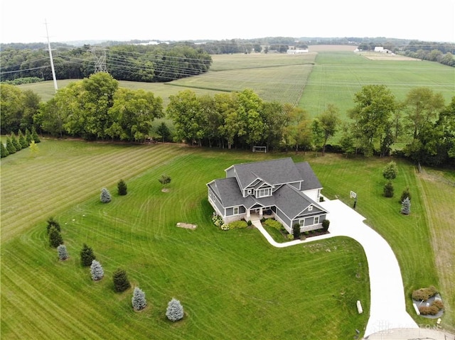 birds eye view of property featuring a rural view