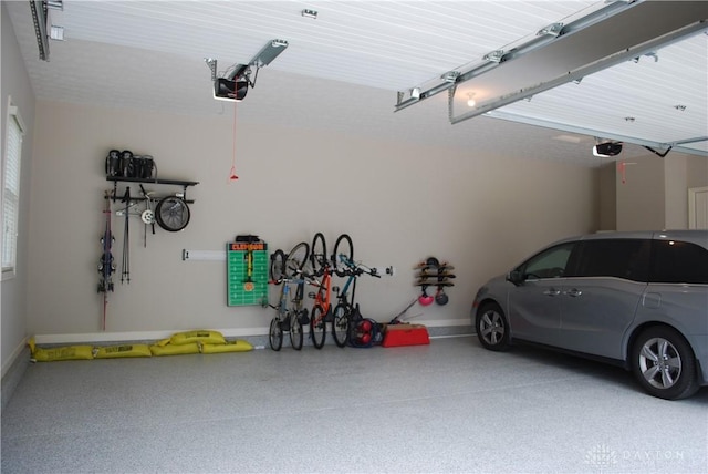 garage featuring a garage door opener