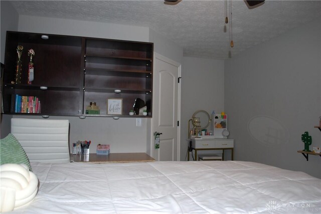 bedroom featuring a textured ceiling