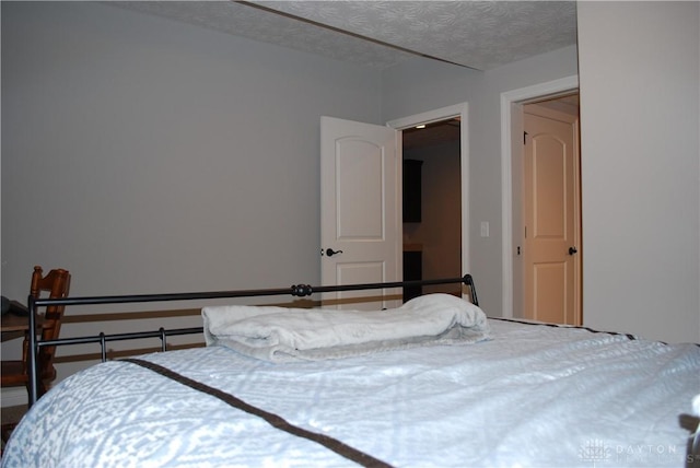 bedroom with a textured ceiling