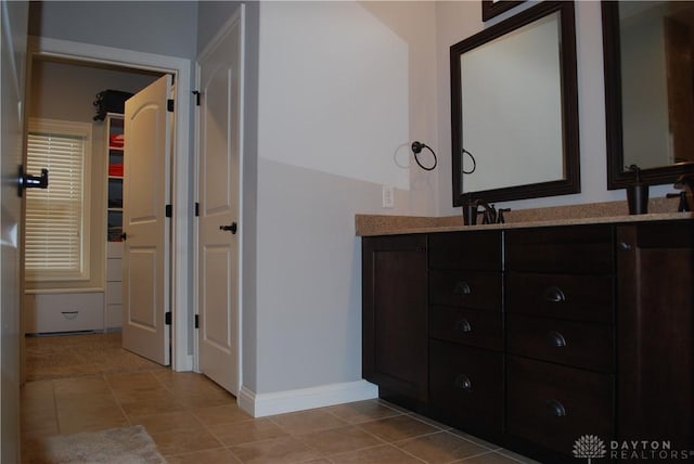 bathroom featuring vanity and tile patterned flooring