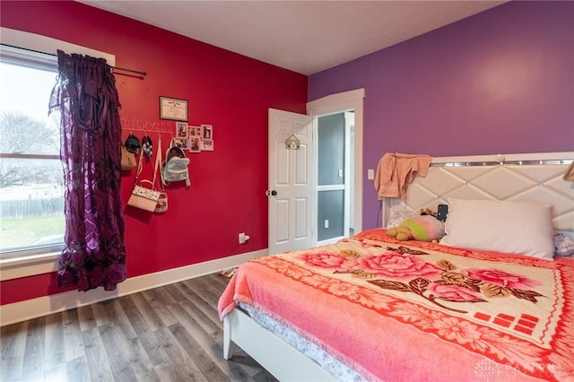 bedroom featuring wood-type flooring