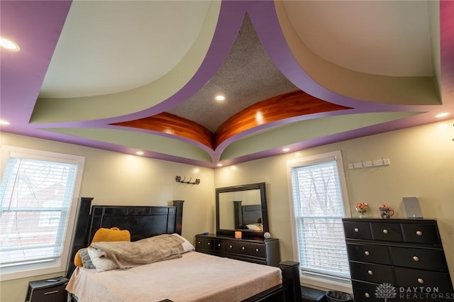 bedroom featuring lofted ceiling