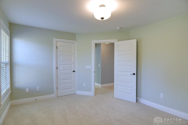 9460 Banyan Ct, Centerville, OH 45458 - unfurnished bedroom featuring baseboards and carpet floors