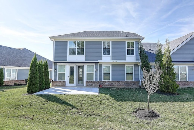 9460 Banyan Ct, Centerville, OH 45458 - view of front of property with a front yard, brick siding, and a patio