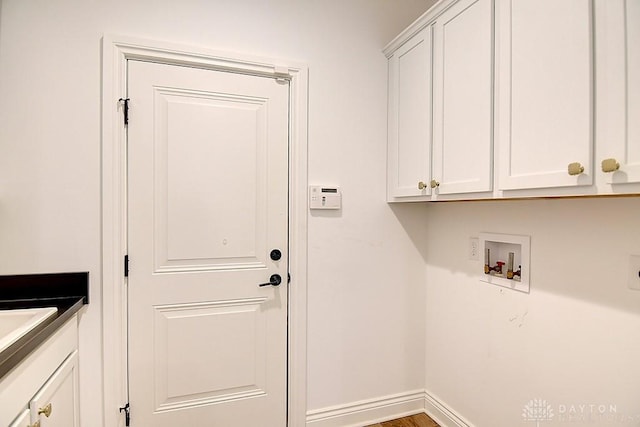 9460 Banyan Ct, Centerville, OH 45458 - washroom with cabinet space, hookup for a washing machine, and baseboards