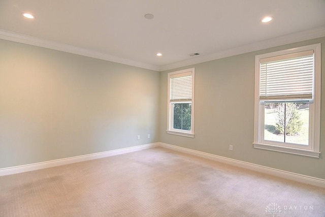 9460 Banyan Ct, Centerville, OH 45458 - unfurnished room with visible vents, a healthy amount of sunlight, crown molding, and baseboards