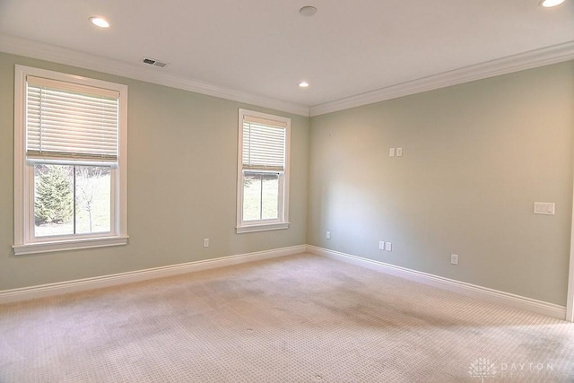 9460 Banyan Ct, Centerville, OH 45458 - unfurnished room with visible vents, light carpet, baseboards, and crown molding