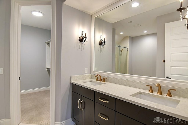 9460 Banyan Ct, Centerville, OH 45458 - full bath featuring double vanity, recessed lighting, baseboards, and a sink
