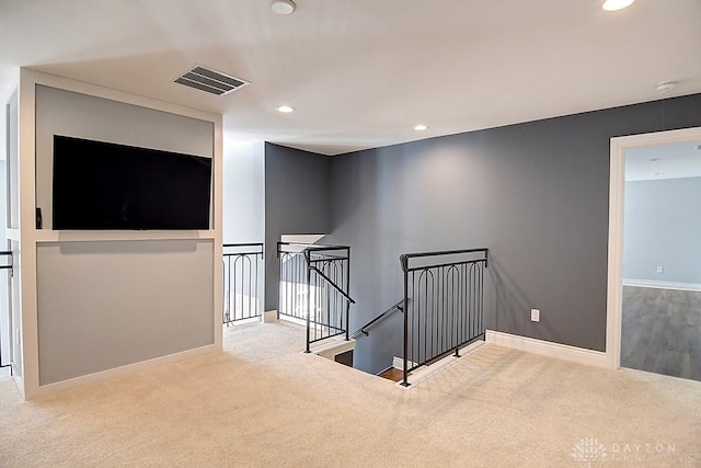 9460 Banyan Ct, Centerville, OH 45458 - hallway featuring visible vents, baseboards, carpet, an upstairs landing, and recessed lighting