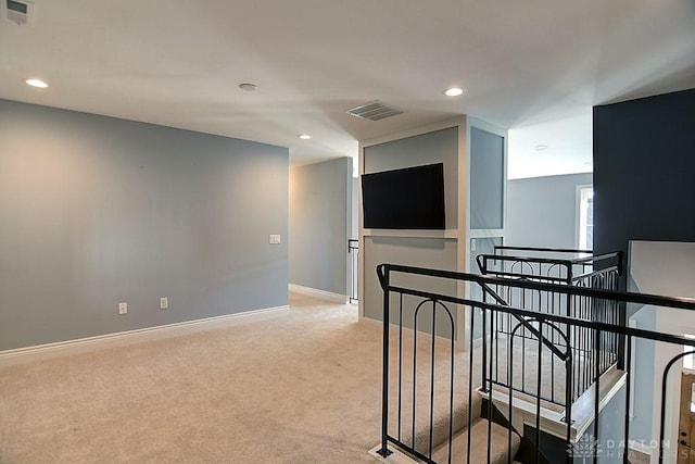 9460 Banyan Ct, Centerville, OH 45458 - hall with visible vents, an upstairs landing, recessed lighting, baseboards, and light colored carpet