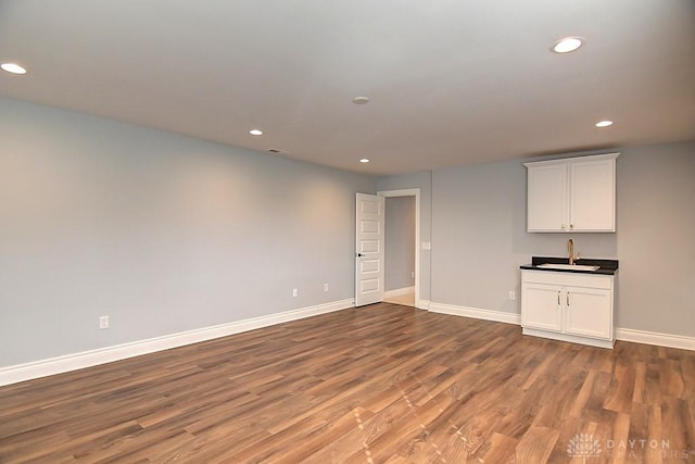 9460 Banyan Ct, Centerville, OH 45458 - interior space featuring a sink, wood finished floors, recessed lighting, wet bar, and baseboards