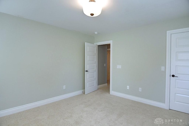 9460 Banyan Ct, Centerville, OH 45458 - unfurnished bedroom with baseboards and light carpet