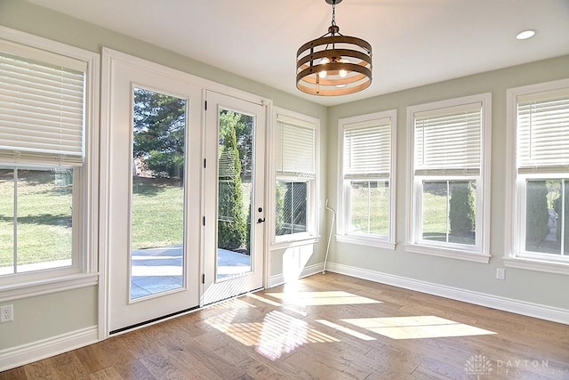 9460 Banyan Ct, Centerville, OH 45458 - doorway to outside with recessed lighting, baseboards, an inviting chandelier, and wood finished floors