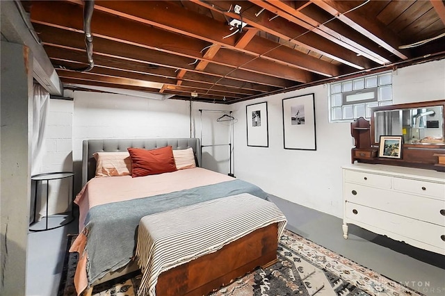 bedroom with concrete flooring