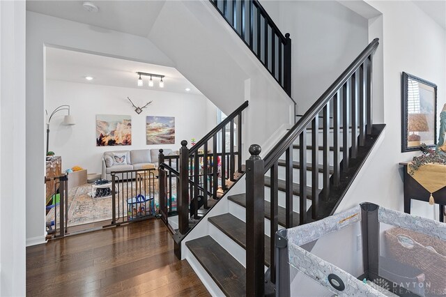 stairway with wood-type flooring