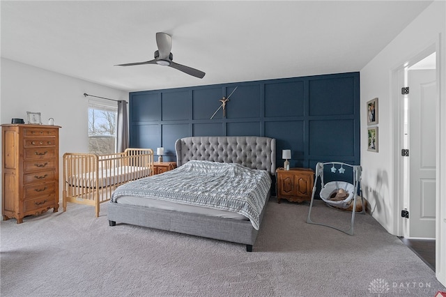 bedroom featuring ceiling fan and carpet flooring