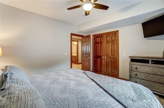 bedroom with a closet and ceiling fan