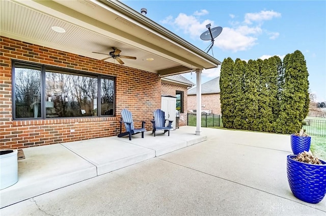 view of patio featuring ceiling fan