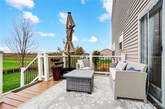 wooden terrace featuring an outdoor hangout area