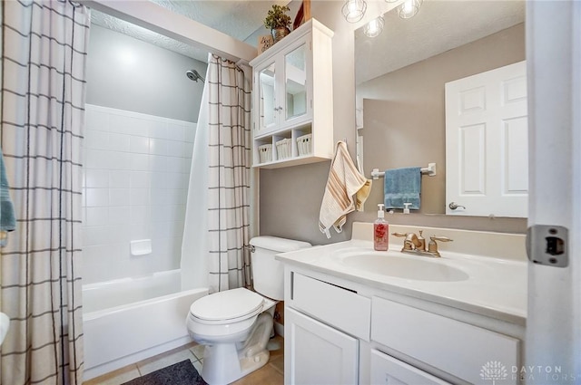 full bathroom featuring shower / tub combo with curtain, vanity, toilet, tile patterned floors, and a textured ceiling