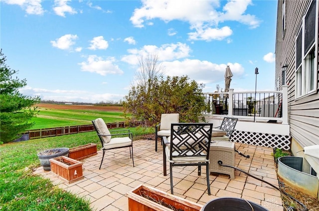 view of patio / terrace with an outdoor fire pit