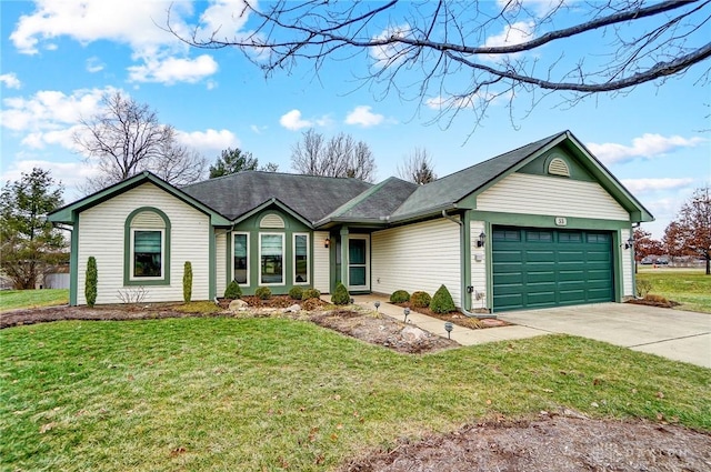 ranch-style house featuring a garage and a front lawn