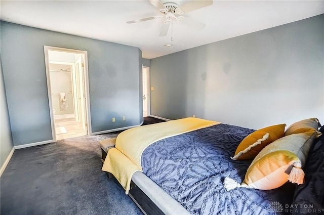 carpeted bedroom featuring connected bathroom and ceiling fan