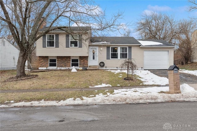 split level home featuring a garage