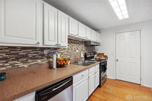 kitchen featuring white cabinetry, sink, and appliances with stainless steel finishes