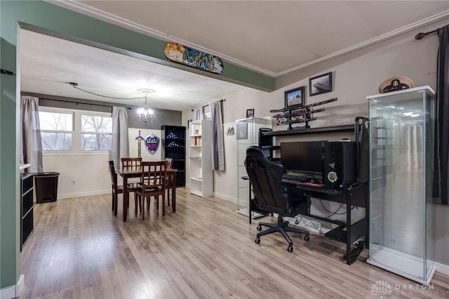 office area with a notable chandelier and hardwood / wood-style flooring