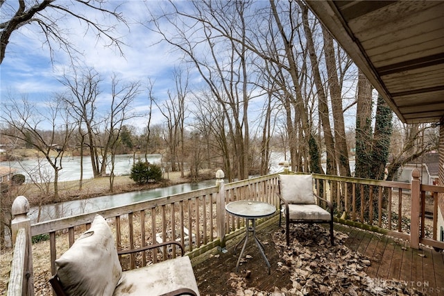 deck featuring a water view