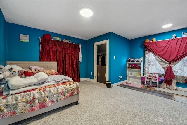 bedroom featuring carpet