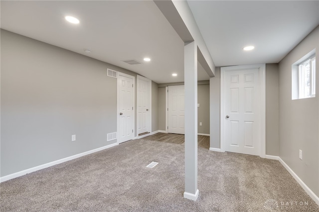 basement with carpet floors