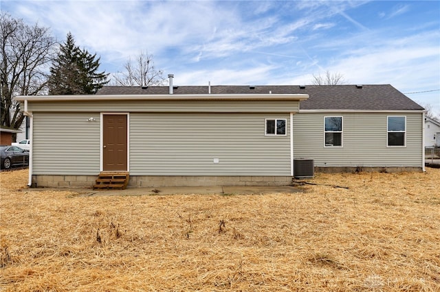 back of property with central AC unit